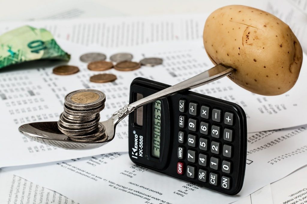 a calculator and coins