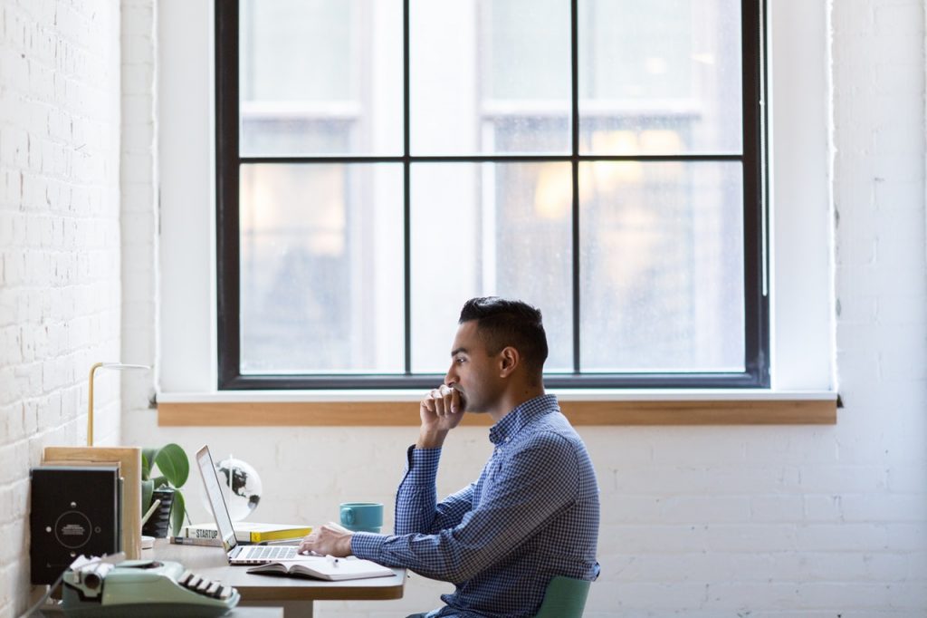 a woman sitting at a desk