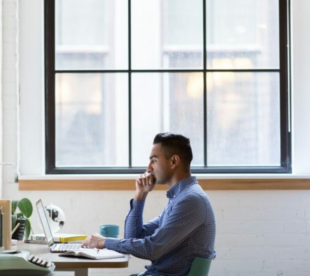 a woman sitting at a desk