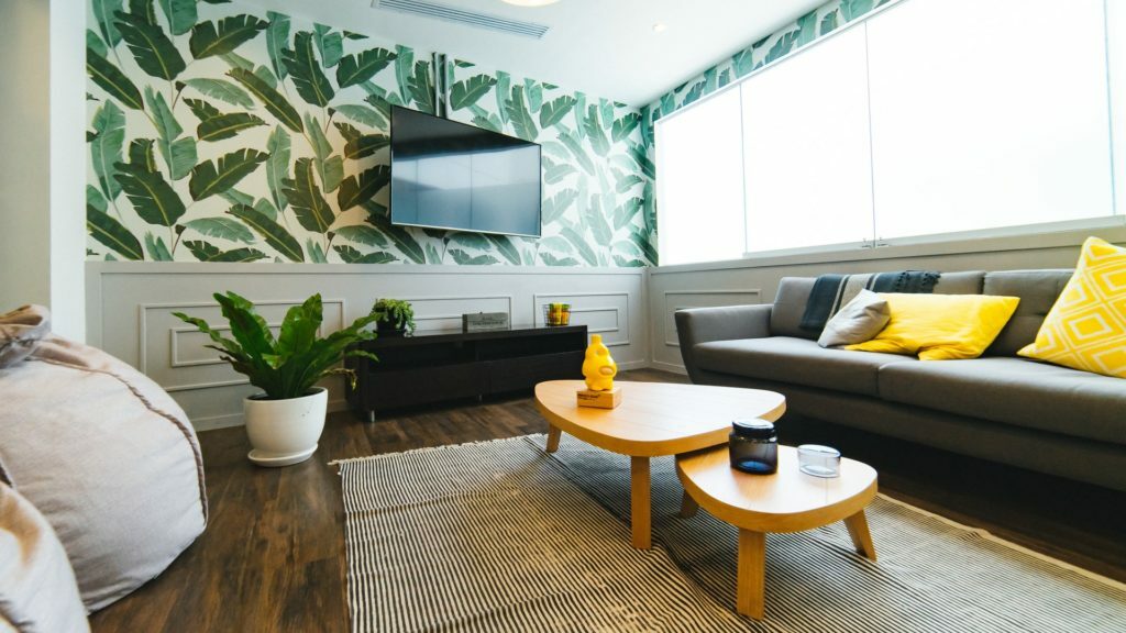 a living room with a large screen