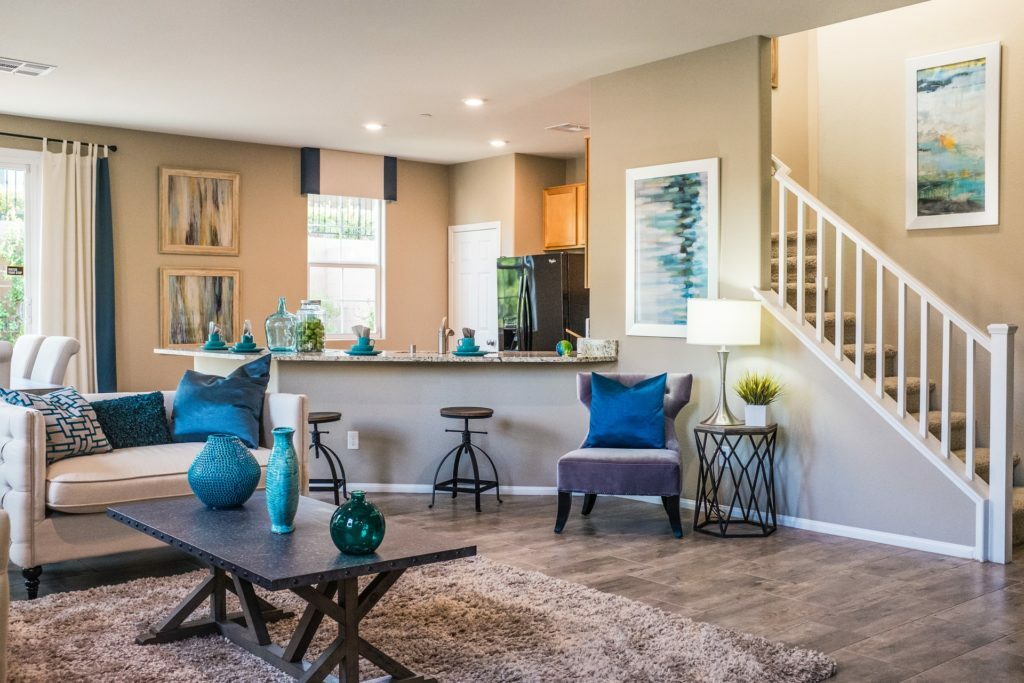 a living room with a large rug