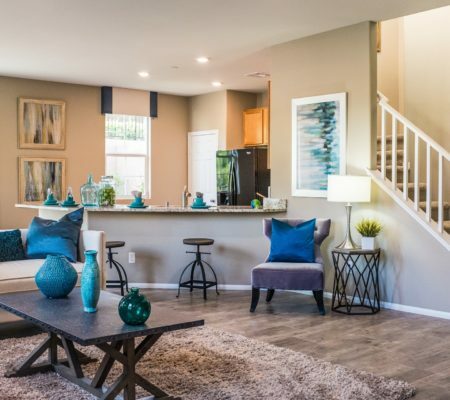 a living room with a large rug