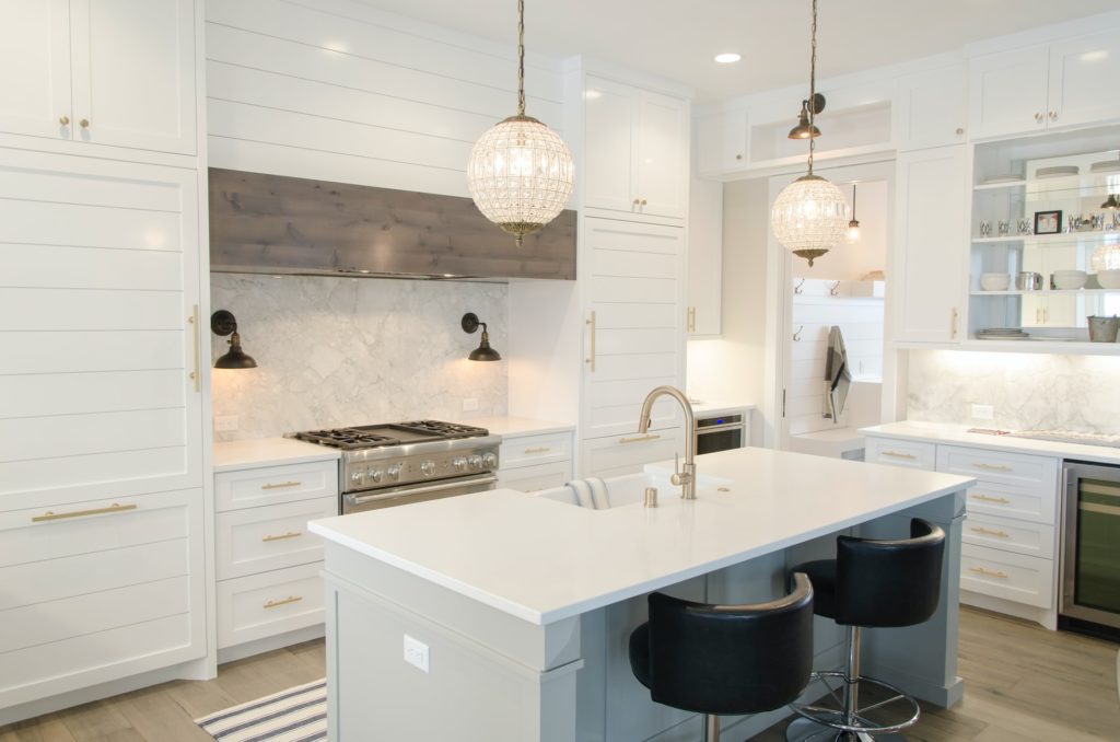 a kitchen with a white counter