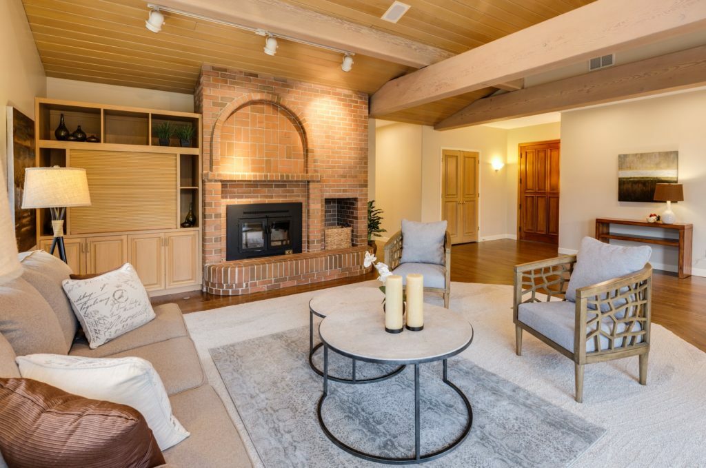 a living room with a fireplace