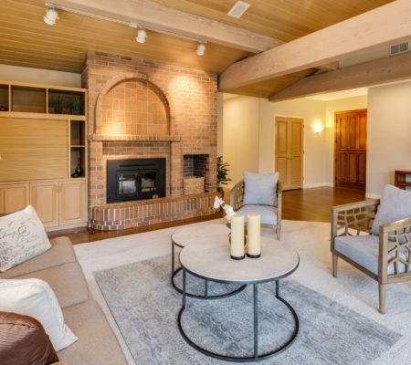 a living room with a fireplace