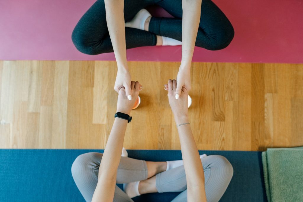 a group of people doing yoga