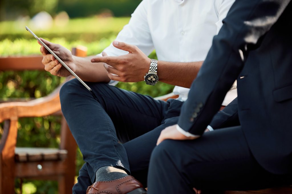 a man sitting on a bench