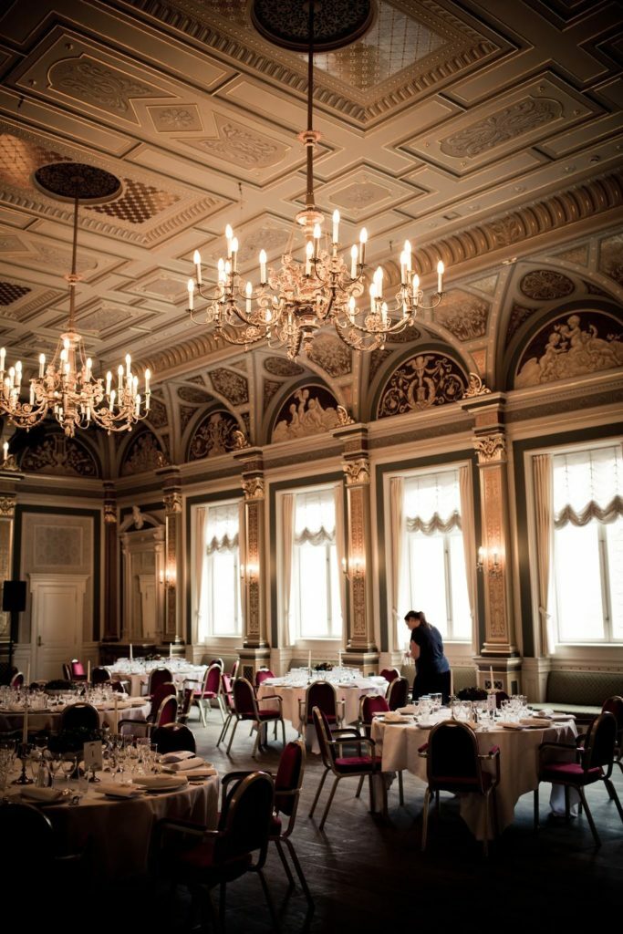 a room with tables and chairs