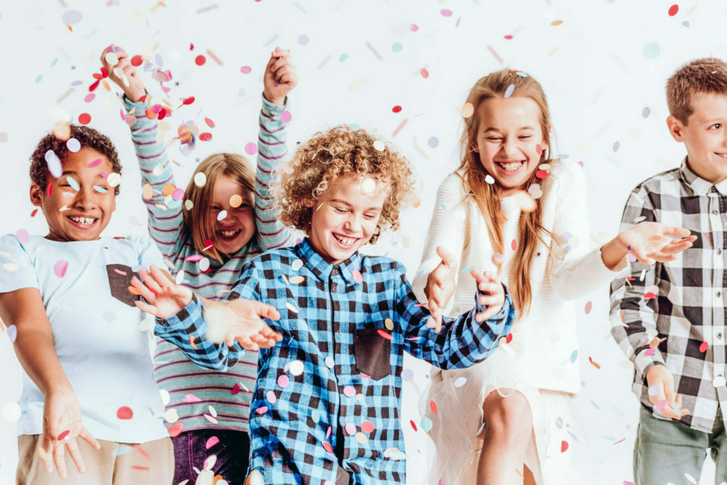 a group of children posing for a photo