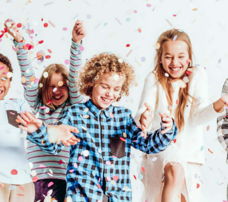 a group of children posing for a photo