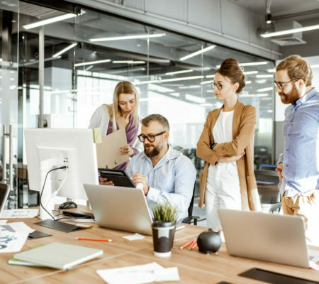 a group of people in an office