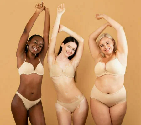 Multiracial Ladies raicing their arms