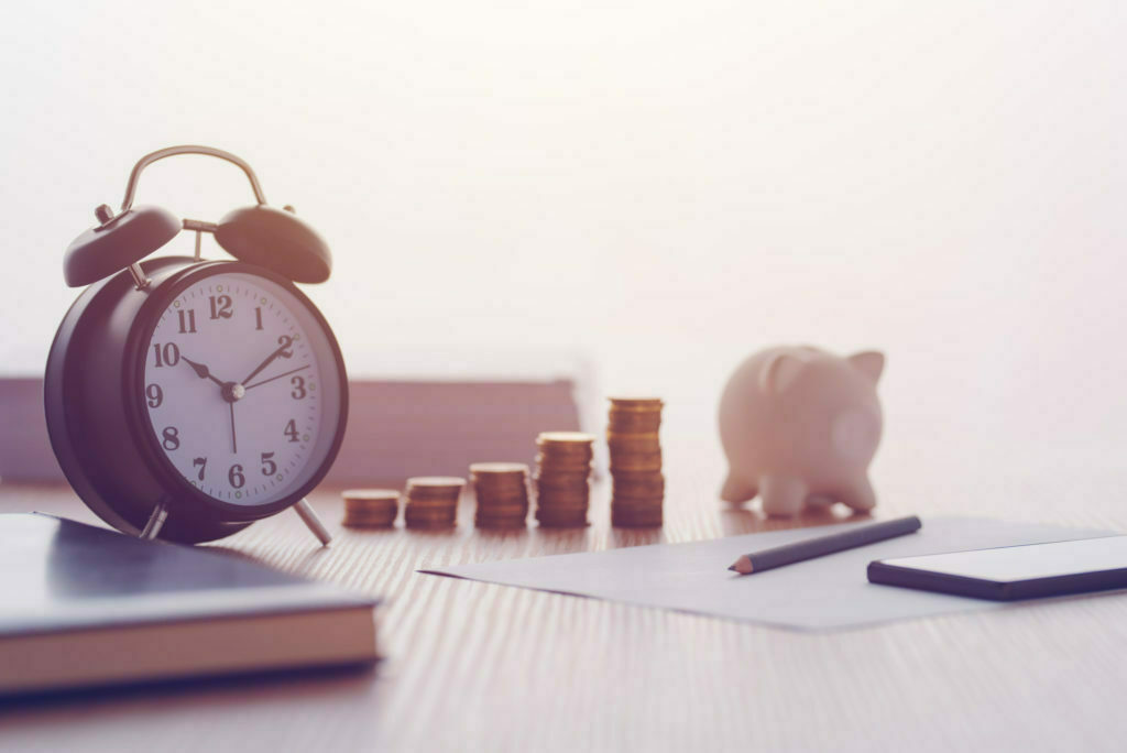 a clock and a group of coins