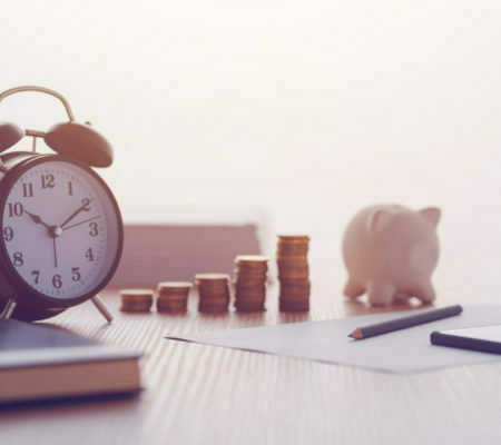 a clock and a group of coins