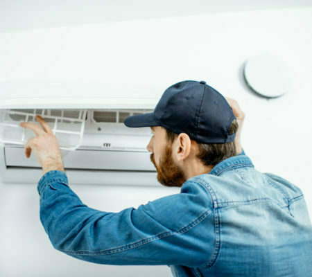 Man serving the air conditioner