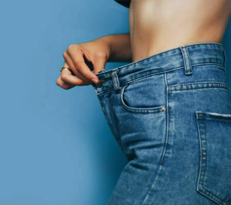 skinny woman body with Loose pants jeans, Light weight body with loose clothes, slender and Healthy body low fat concept
